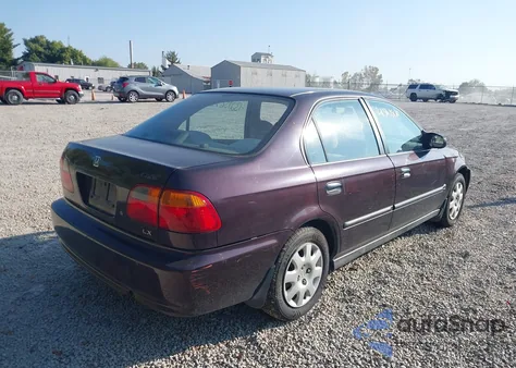 2000 Honda Civic Lx z USA, uszkodzony, nr VIN 1HGEJ6673YL065219